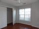 Bedroom with window, closet, and ceiling fan at 4664 Southgate Pkwy., Myrtle Beach, SC 29579