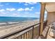 Breathtaking oceanfront view from a private balcony, perfect for relaxing and enjoying the scenery at 4800 S Ocean Blvd. # 1103, North Myrtle Beach, SC 29582