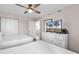 Bedroom featuring two queen beds, a dresser with a TV, and a ceiling fan at 4800 S Ocean Blvd. # 1103, North Myrtle Beach, SC 29582