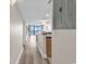 Hallway leading to a living room featuring ocean views at 4800 S Ocean Blvd. # 1103, North Myrtle Beach, SC 29582