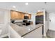 Kitchen featuring wooden cabinets, granite counters, and black appliances at 4800 S Ocean Blvd. # 1103, North Myrtle Beach, SC 29582
