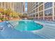 Large outdoor pool with sundeck and lounge chairs, surrounded by resort buildings at 4800 S Ocean Blvd. # 1103, North Myrtle Beach, SC 29582