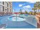 Fun splash pool with mushroom fountain plus a large pool and sundeck with chairs at 4800 S Ocean Blvd. # 1103, North Myrtle Beach, SC 29582