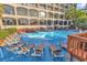 Relaxing pool area with lounge chairs, perfect for soaking up the sun at 4800 S Ocean Blvd. # 1103, North Myrtle Beach, SC 29582