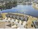 Aerial view of townhomes, a pond, and lush landscaping at 5012 Prato Loop # 5012, Myrtle Beach, SC 29579