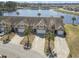 Beautiful aerial view of waterfront townhomes with private driveways and garage at 5012 Prato Loop # 5012, Myrtle Beach, SC 29579