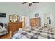 Spacious bedroom featuring vaulted ceilings and wooden dressers, offering ample storage and a classic aesthetic at 5012 Prato Loop # 5012, Myrtle Beach, SC 29579