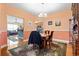 Dining room with hardwood floors, chandelier lighting, and view of the kitchen at 5012 Prato Loop # 5012, Myrtle Beach, SC 29579