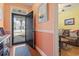 Well-lit foyer with hardwood floors, decorative rug, and view to the living room at 5012 Prato Loop # 5012, Myrtle Beach, SC 29579