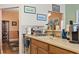 Spacious kitchen area with wood cabinets and a breakfast bar at 5012 Prato Loop # 5012, Myrtle Beach, SC 29579