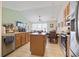 Well-lit kitchen featuring wood cabinetry, stainless steel appliances, and a functional island at 5012 Prato Loop # 5012, Myrtle Beach, SC 29579