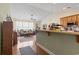 Open concept living space with breakfast bar connecting to the living room at 5012 Prato Loop # 5012, Myrtle Beach, SC 29579