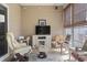 Relaxing sunroom boasts natural light, neutral tones and comfortable seating at 5012 Prato Loop # 5012, Myrtle Beach, SC 29579