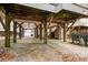Spacious covered carport area offering parking and storage with concrete flooring and wooden support beams at 6001 - 1125 S Kings Hwy., Myrtle Beach, SC 29575