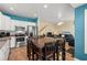 Open kitchen and dining area with stainless steel appliances and hardwood floors at 6001 - 1125 S Kings Hwy., Myrtle Beach, SC 29575