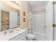 Clean bathroom featuring modern fixtures, tiled walls, and a shower-tub combination with stylish shower curtain at 6001- 310 S Kings Hwy., Myrtle Beach, SC 29575