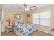 Charming bedroom with ceiling fan, nautical bedding, and bright natural light at 6001- 310 S Kings Hwy., Myrtle Beach, SC 29575