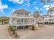 Beautiful coastal home with spacious decks, great for entertaining, on a sunny day near the water at 6001- 310 S Kings Hwy., Myrtle Beach, SC 29575