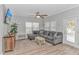 Comfortable living room with modern furnishings, stylish decor, and a door leading to the outside deck at 6001- 310 S Kings Hwy., Myrtle Beach, SC 29575