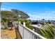 Relaxing balcony seating area with views of the trees, RV park, and ocean at 6001- L08 S Kings Hwy., Myrtle Beach, SC 29575