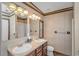 Bright bathroom with a double sink vanity, light fixtures, mirror, and neutral decor at 6001-Mh26 S Kings Hwy., Myrtle Beach, SC 29575