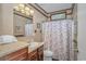 Bathroom featuring a vanity, decorative shower curtain, toilet, and a large mirror at 6001-Mh26 S Kings Hwy., Myrtle Beach, SC 29575