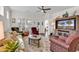 Welcoming living room featuring hardwood floors, neutral walls, and a TV at 6096 Campanella St., Myrtle Beach, SC 29577
