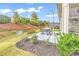 Cozy outdoor patio with seating area, lush landscaping, and inviting atmosphere for relaxation and entertaining at 6096 Campanella St., Myrtle Beach, SC 29577