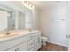 This bathroom features double sink vanity, wood look floor, and shower at 633 Woodside Dr., Conway, SC 29526