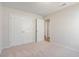Bright bedroom featuring a double door closet and neutral paint at 633 Woodside Dr., Conway, SC 29526