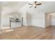 Open-concept living area with vaulted ceilings, wood-look floors, and seamless flow to the kitchen at 633 Woodside Dr., Conway, SC 29526