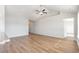Open-concept living area featuring high ceilings, wood-look flooring, and lots of natural light at 633 Woodside Dr., Conway, SC 29526