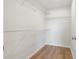 This walk-in closet offers wire rack shelving and wood-look floor at 633 Woodside Dr., Conway, SC 29526