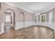 Formal dining room with natural light, beautiful floors, and wainscoting at 653 Whispering Pines Ct., Murrells Inlet, SC 29576
