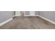 Hallway features neutral carpet and wide base molding at 653 Whispering Pines Ct., Murrells Inlet, SC 29576