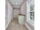 Finished hallway features neutral carpet and utility sink at 653 Whispering Pines Ct., Murrells Inlet, SC 29576