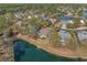 Lovely aerial view of a pond-front home in a desirable community near mature trees and attractive landscaping at 742 Camden Circle, Pawleys Island, SC 29585