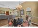Dining room with stylish chairs and chandelier at 742 Camden Circle, Pawleys Island, SC 29585