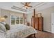 Inviting main bedroom with a tray ceiling and a view of the lake at 742 Camden Circle, Pawleys Island, SC 29585