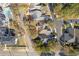 Birds eye view of residential streets showcasing several backyard patios and mature trees at 808 Arbor Ln., North Myrtle Beach, SC 29582