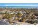 Aerial view of a residential area near the coast featuring mature trees and bright blue sky at 808 Arbor Ln., North Myrtle Beach, SC 29582