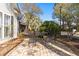 Outdoor patio featuring brick pavers and an iron patio table, perfect for outdoor dining at 808 Arbor Ln., North Myrtle Beach, SC 29582