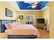 Bright bedroom features hardwood floors, ceiling fan, and ample natural light at 808 Arbor Ln., North Myrtle Beach, SC 29582