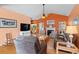 Spacious living room with a fireplace, comfortable seating, and abundant natural light at 808 Arbor Ln., North Myrtle Beach, SC 29582