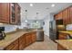 Well-equipped kitchen featuring granite countertops, stainless steel appliances, and ample cabinet space at 124 Mesa Raven Dr., Longs, SC 29568