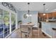 Eat-in kitchen featuring a cozy breakfast nook with sliding doors leading to an outdoor space at 124 Mesa Raven Dr., Longs, SC 29568