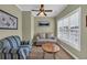 Cozy living room with comfortable seating and natural light, perfect for relaxation and conversation at 124 Mesa Raven Dr., Longs, SC 29568