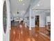 Spacious living room with hardwood floors, fireplace, and an open floor plan at 124 Mesa Raven Dr., Longs, SC 29568