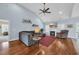 Comfortable living room featuring a fireplace, vaulted ceilings, and a cozy seating area at 124 Mesa Raven Dr., Longs, SC 29568