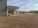 Spacious backyard with a covered patio, perfect for outdoor entertaining at 1304 Winding Creek Way, Myrtle Beach, SC 29588